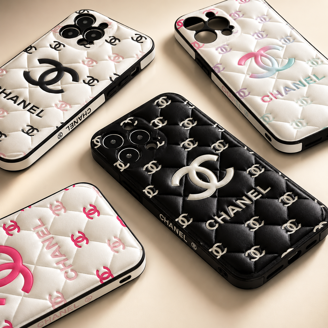 Chanel phone cases with quilted design and brand logo on a beige background