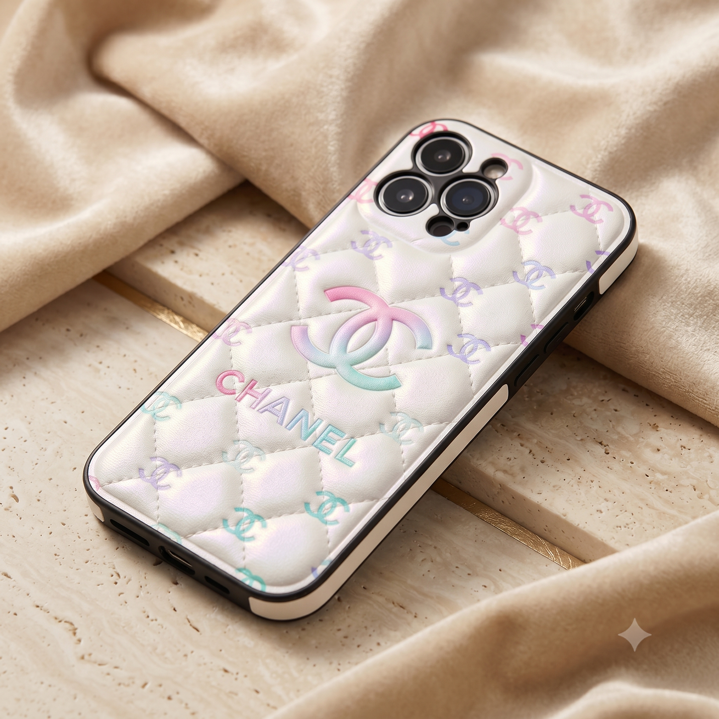 Chanel IPhone case Chanel phone case with quilted design and logo on a beige fabric background