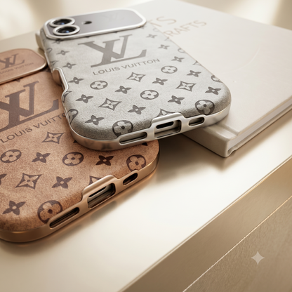 Louis Vuitton iPhone Case – Premium Leather Cover iPhone Case 17 Pro max | Black & Brown - Louis Vuitton phone cases on a light surface
