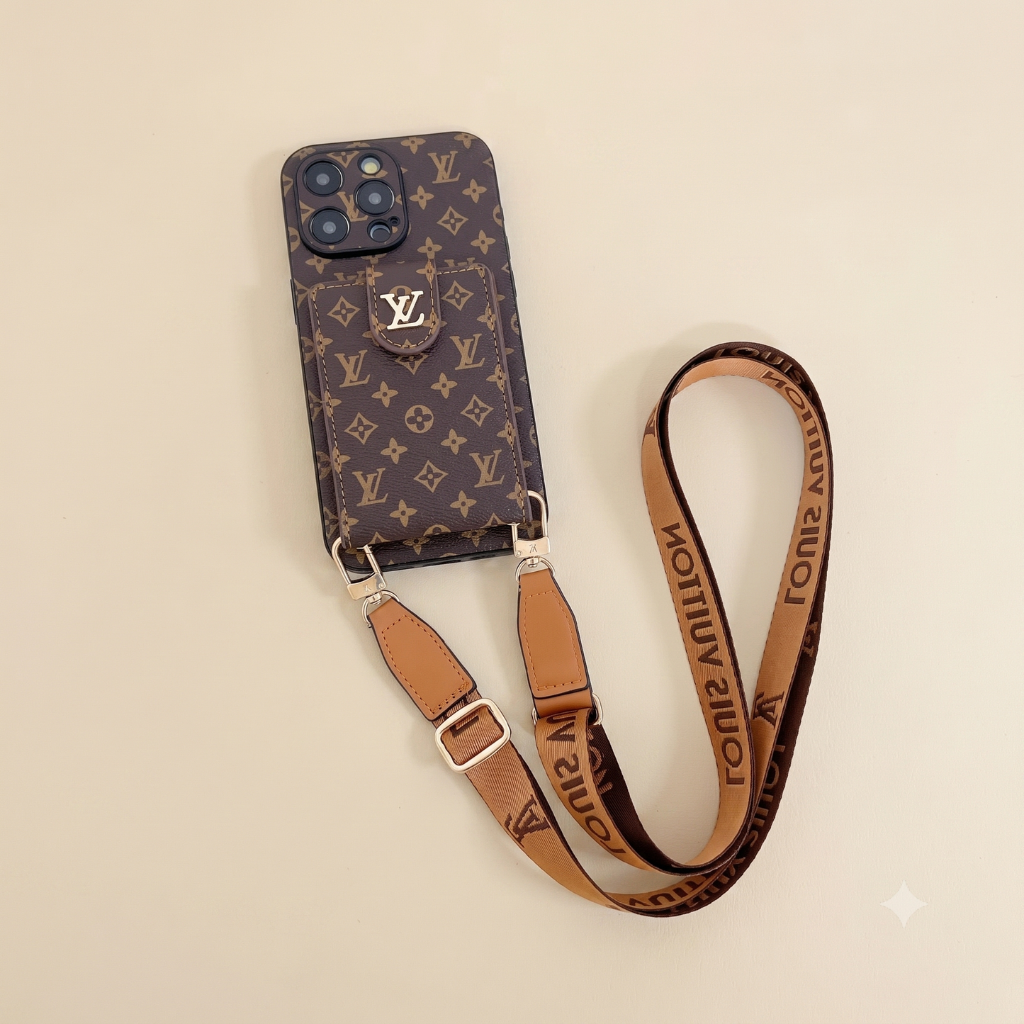 lv Louis Vuitton phone case with matching strap on a beige background