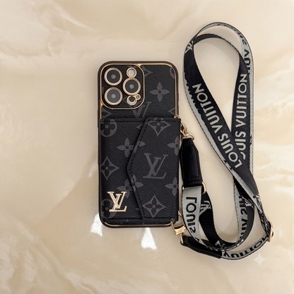 Louis Vuitton iphone case with strap on a black 