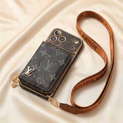 Louis Vuitton phone case with strap on a beige fabric background