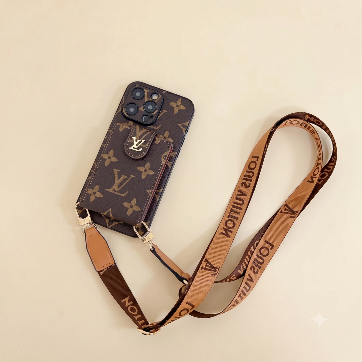 Phone case with matching strap featuring Louis Vuitton monogram on a beige background
