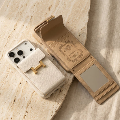 White and beige iPhone cases with gold-coloured H buckle; beige flap open showing card slots and mirror.