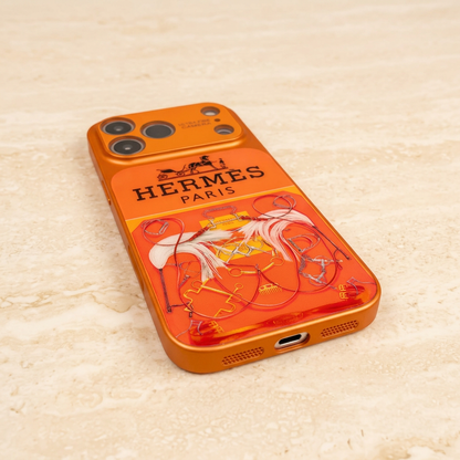 Style A orange equestrian design case viewed from its bottom edge, showing a central charging-port opening between two grille groups.