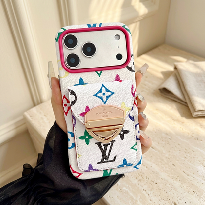 Hand-held white multicolour monogram rear-pocket case without a strap, showing pink camera trim and the large gold-tone clasp.