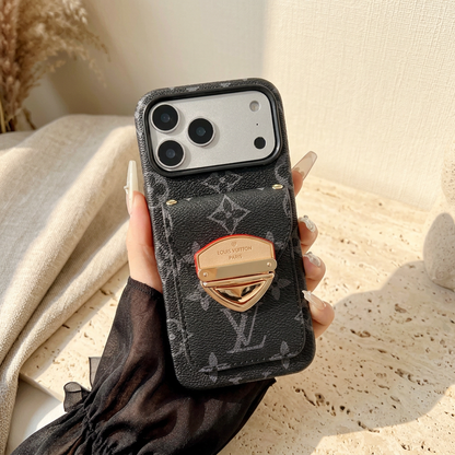 Style C tonal black monogram rear-pocket case without a strap, showing its textured dark surface and contrasting gold-tone clasp.