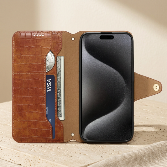 Open brown alligator-print folio showing two card slots, sample cards, a folded note pocket, phone screen and open snap tab.