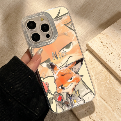 Close hand-held Nick case showing the orange fox face, silver-tone Nick name, smaller fox holding a rose and clear-looking camera surround.