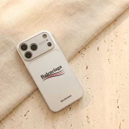 Diagonal flat rear view of the silver-toned White case with black and red curved stripes, smaller lower name detail and a broad camera panel.